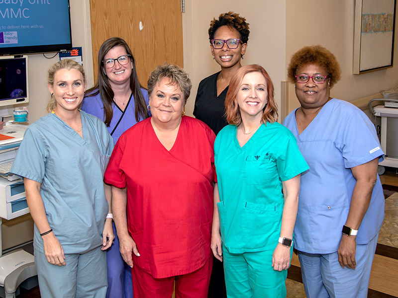 UMMC's team of International Board Certified Lactation Consultants includes front row from left, Laurie McHenry, RN; Cheryl Lloyd, RN; Lauren Ryan, RN; Evora Knight, RN; back row, Marci Talbot, registered dietician and Valerie Stingley, RN.